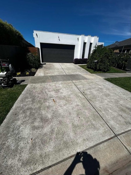 A concrete driveway at a Ballarat home, photographed before pressure washing